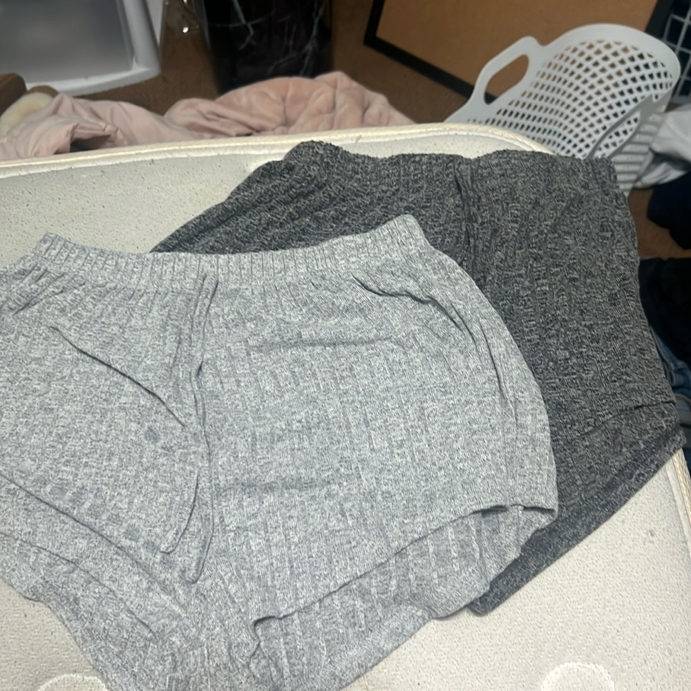 2 pairs of gray shorts.
